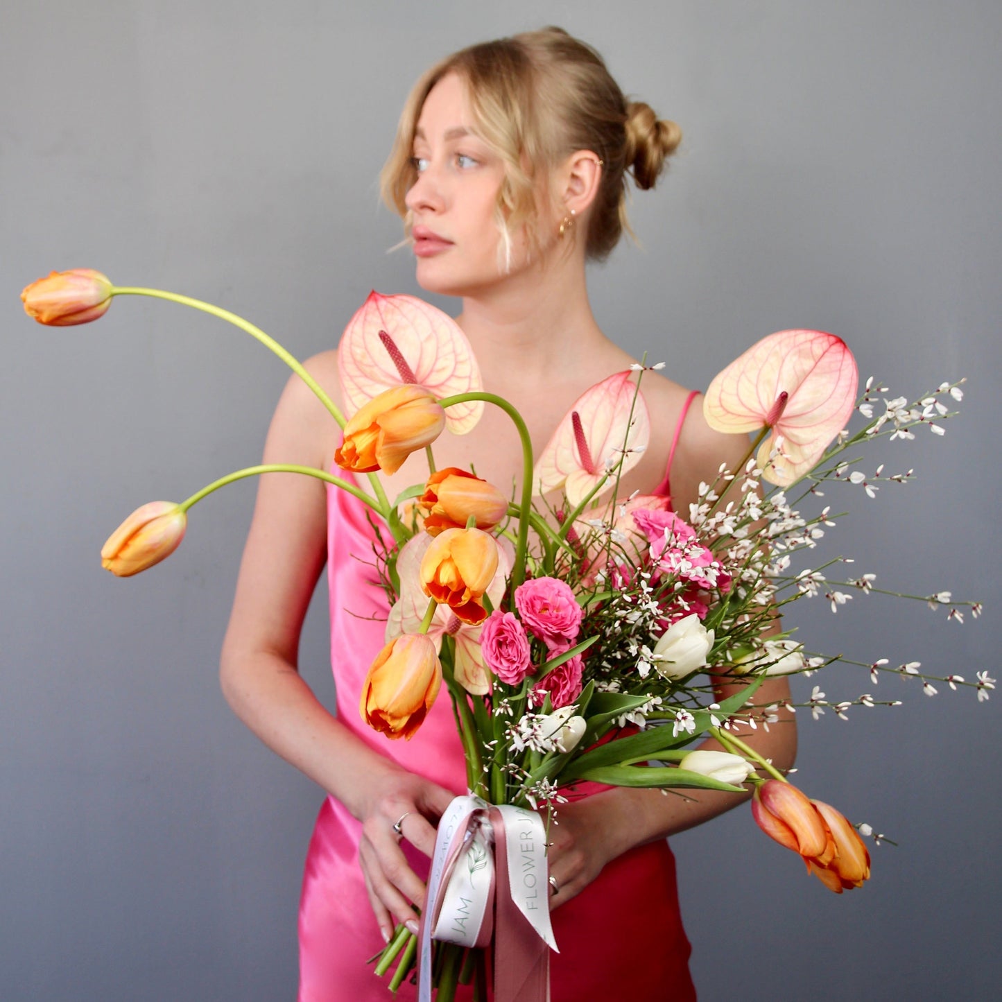 lady with flowers pink delivery gifts