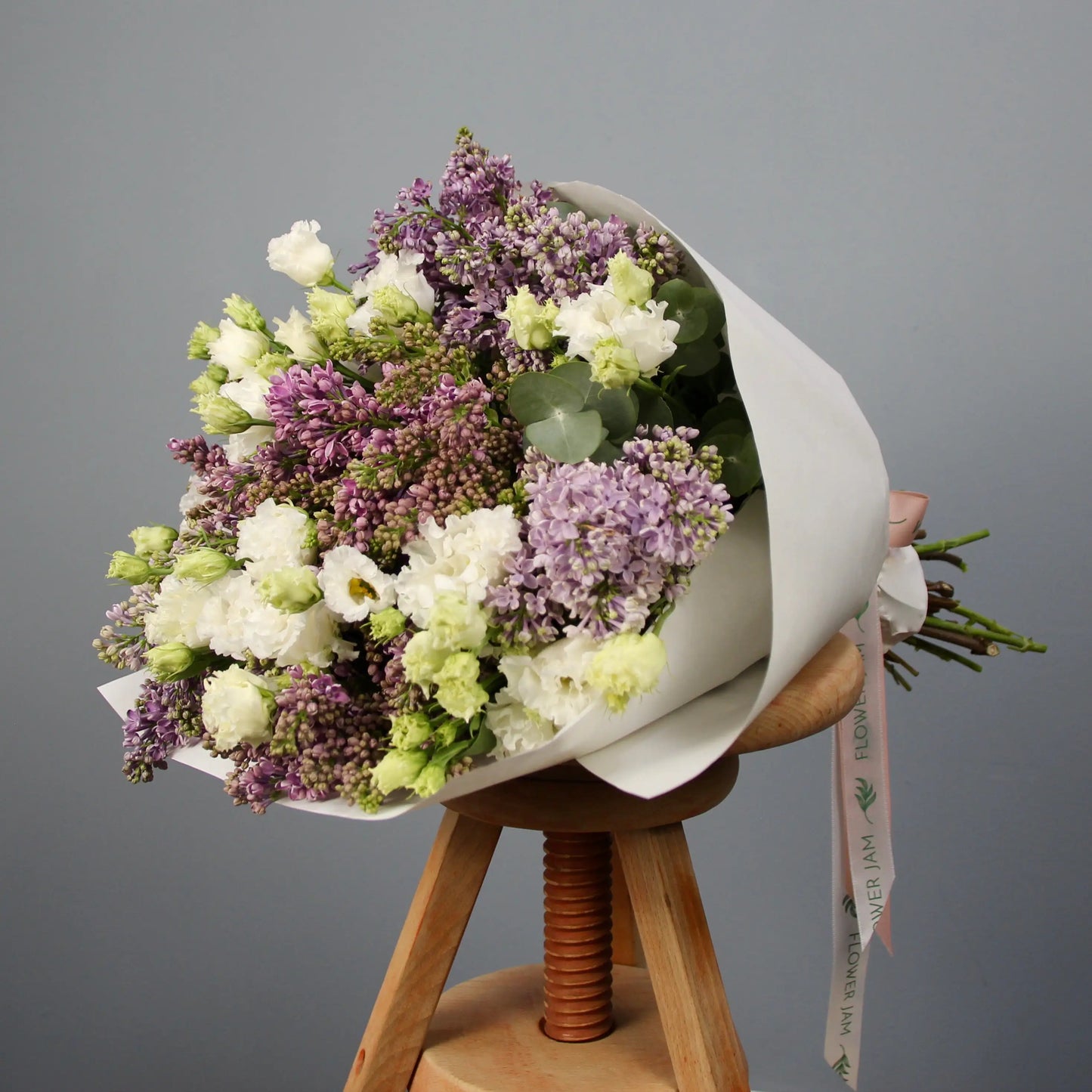 bouquet of syringa blooms and lisianthus