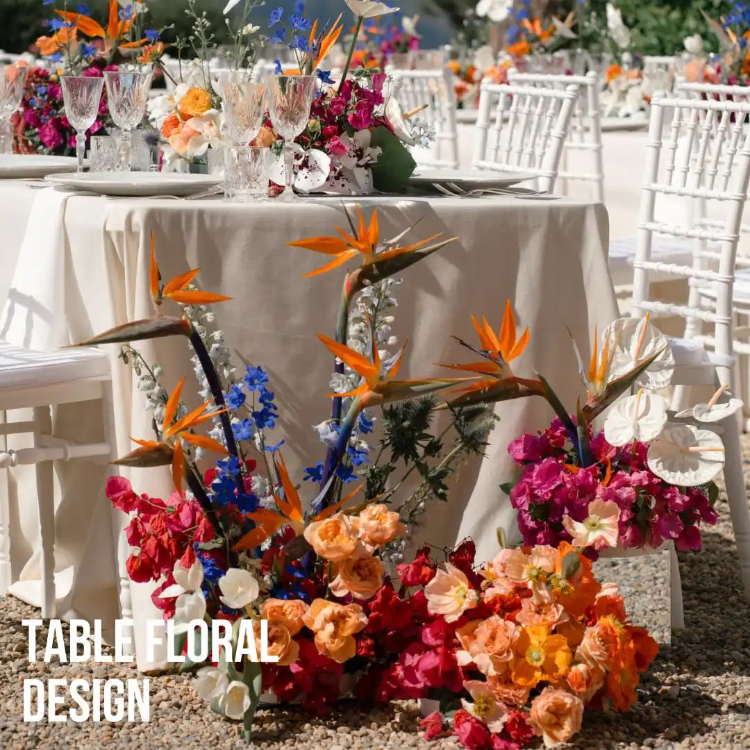 wedding table composition with orange flowers