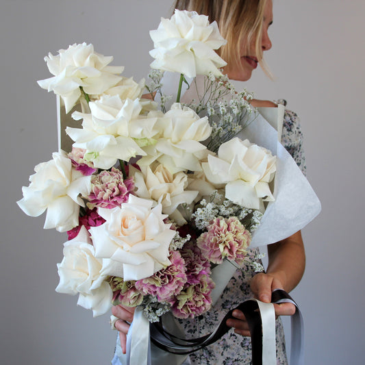 white roses with dianthus