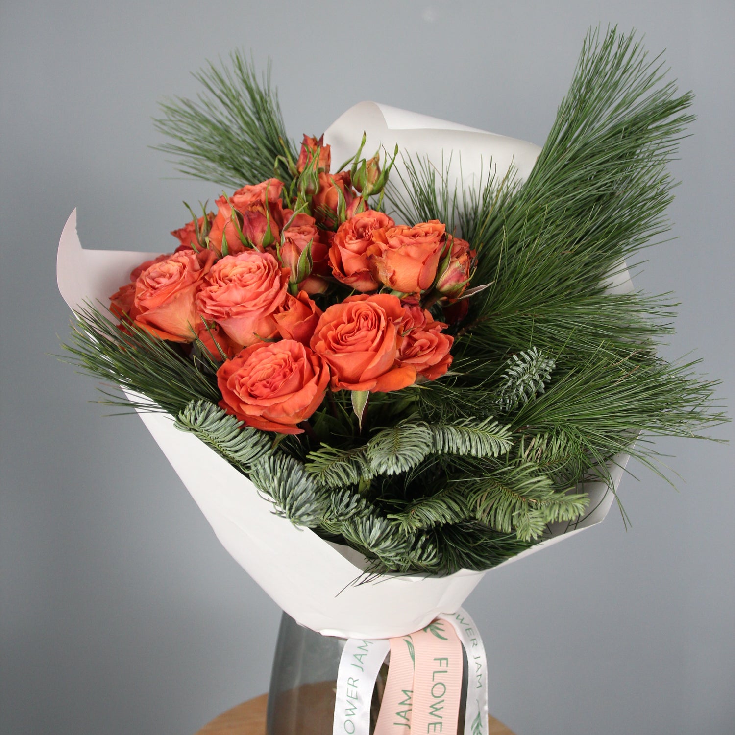 Orange roses and christmas tree