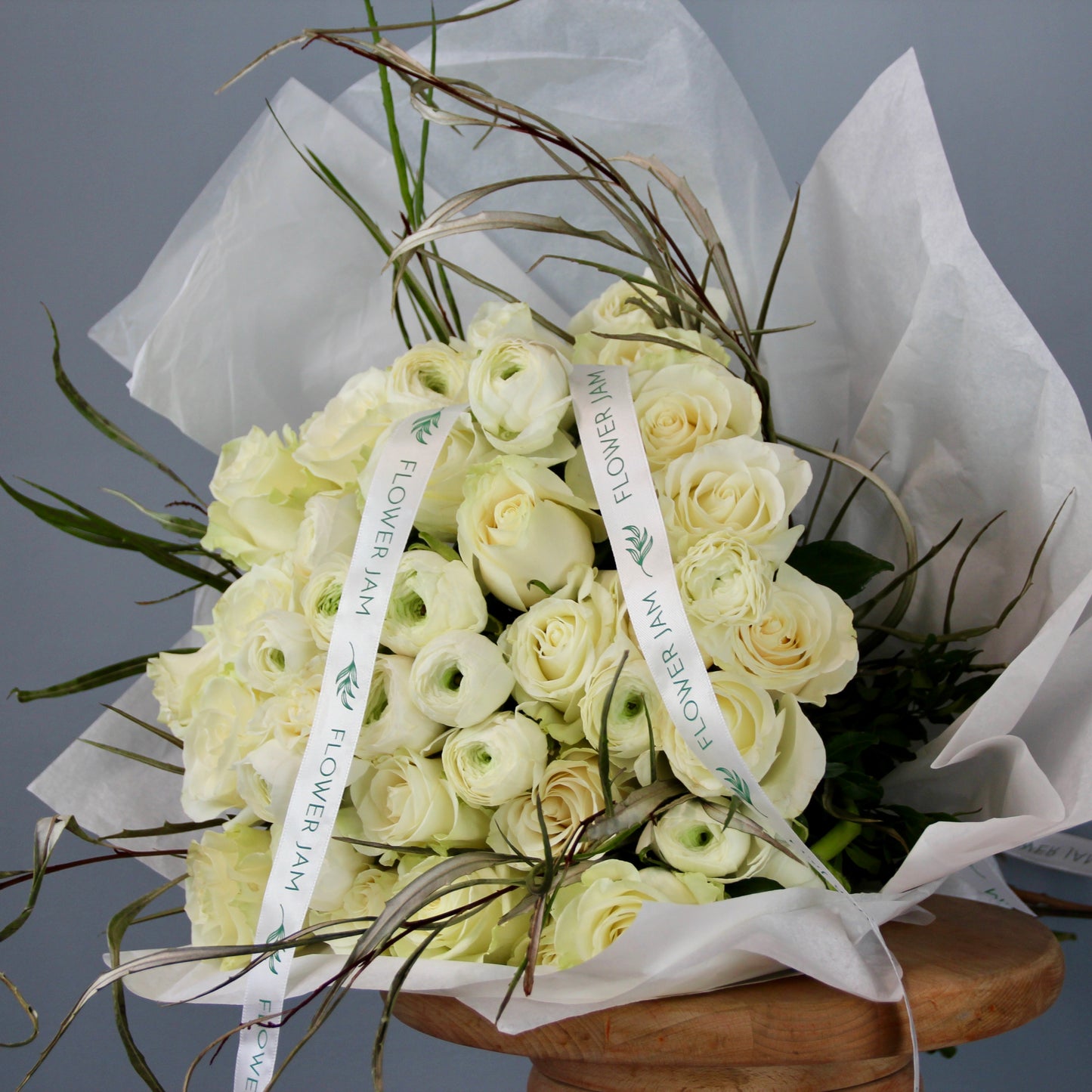 Bouquet of white flowers roses ranunculus