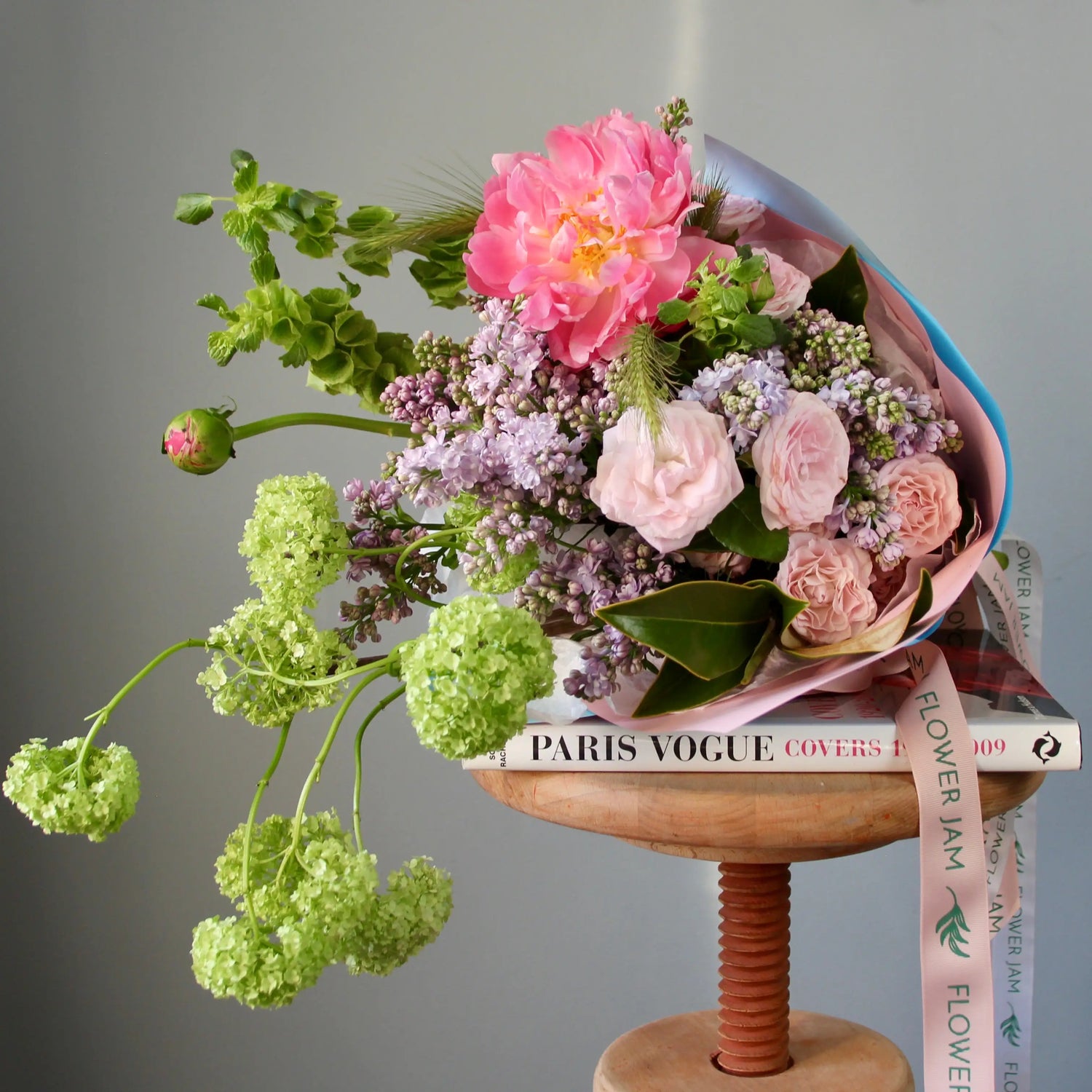 bouquet of pink flowers and greenery