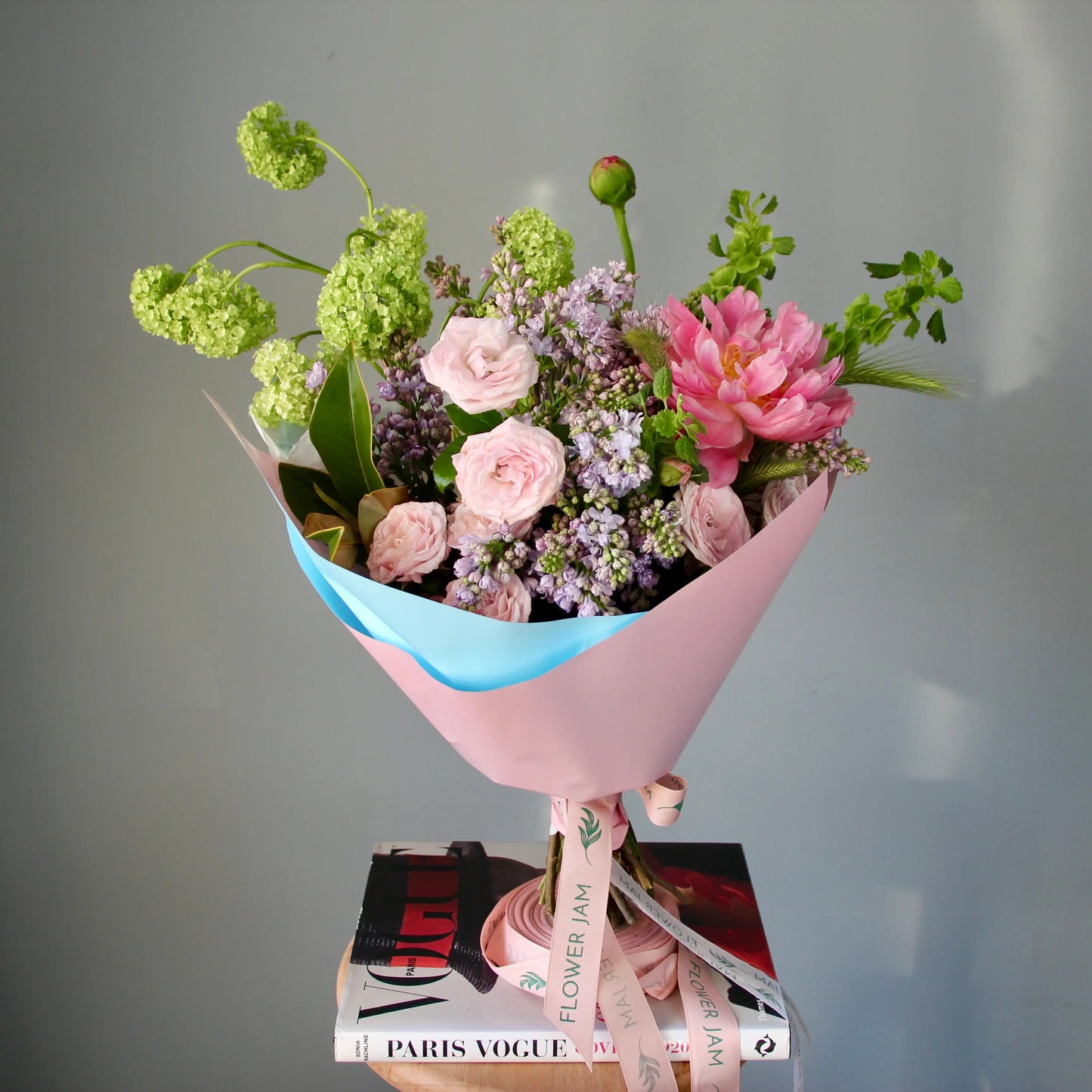 bouquet of pink flowers and greenery