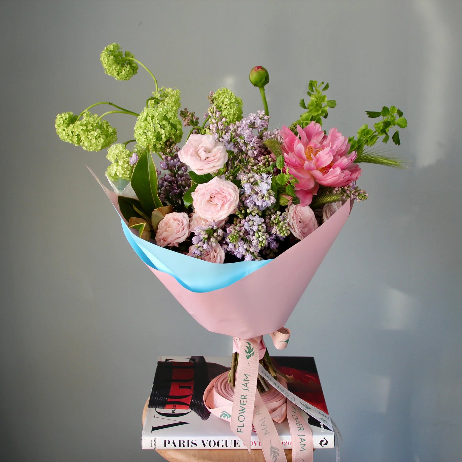 bouquet of pink flowers and greenery