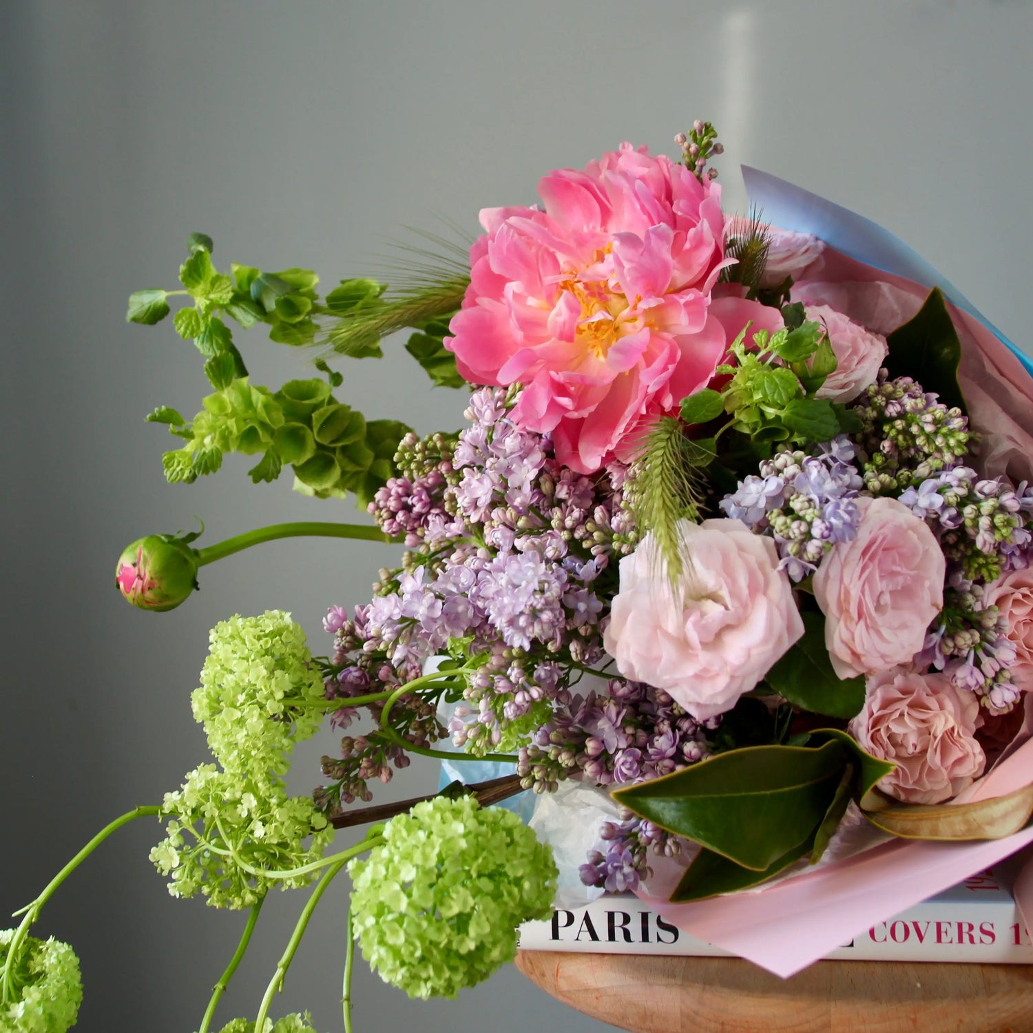 bouquet of pink flowers and greenery