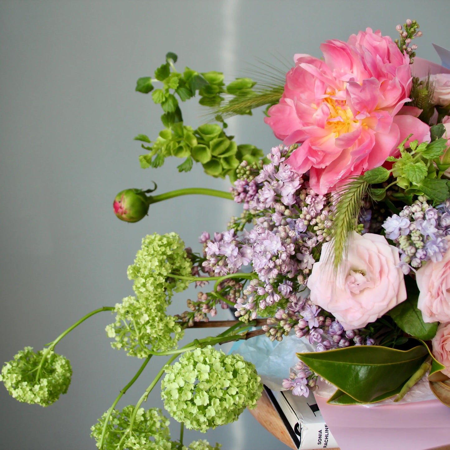 bouquet of pink flowers and greenery