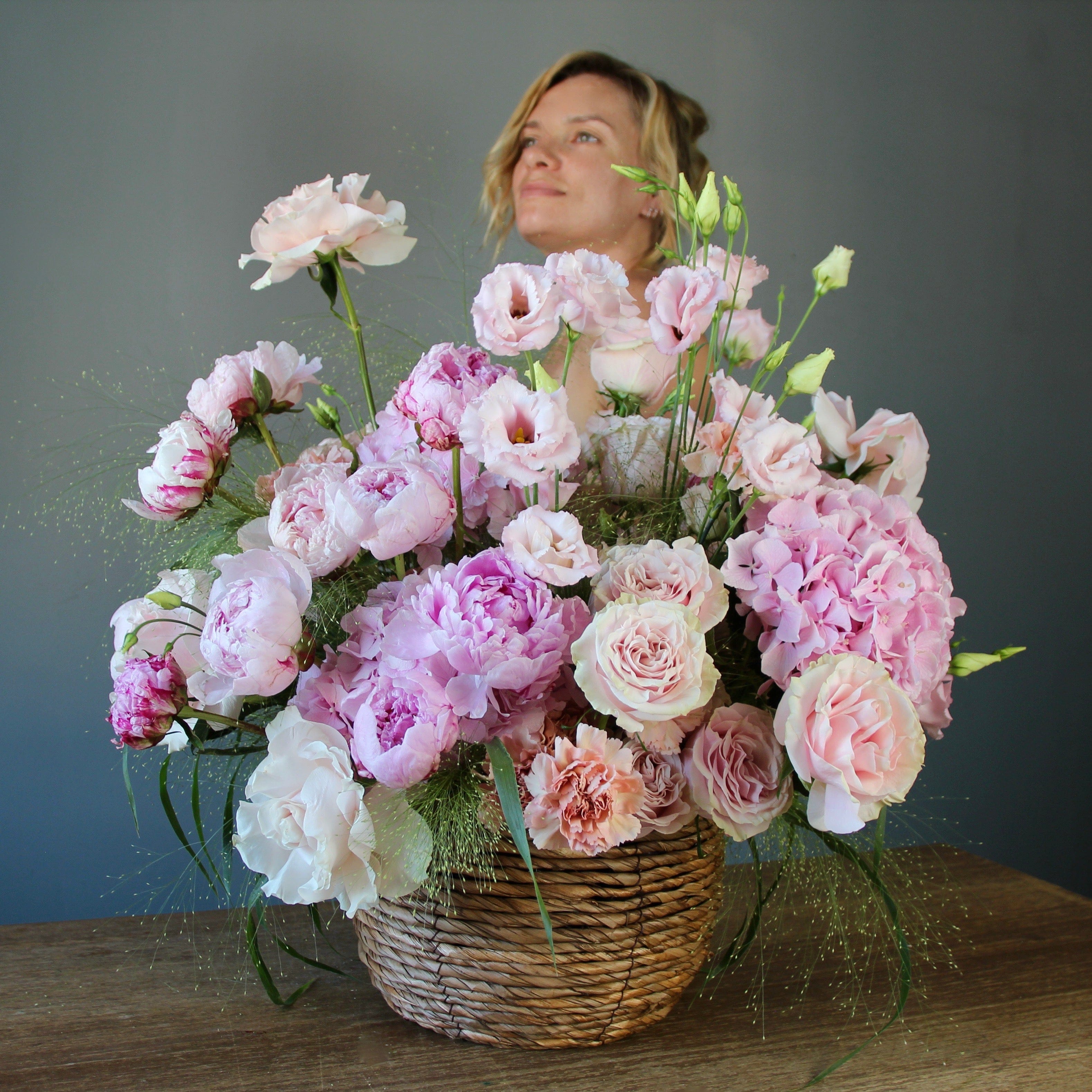 pink flowers delivery in Genoa Flowers in a basket