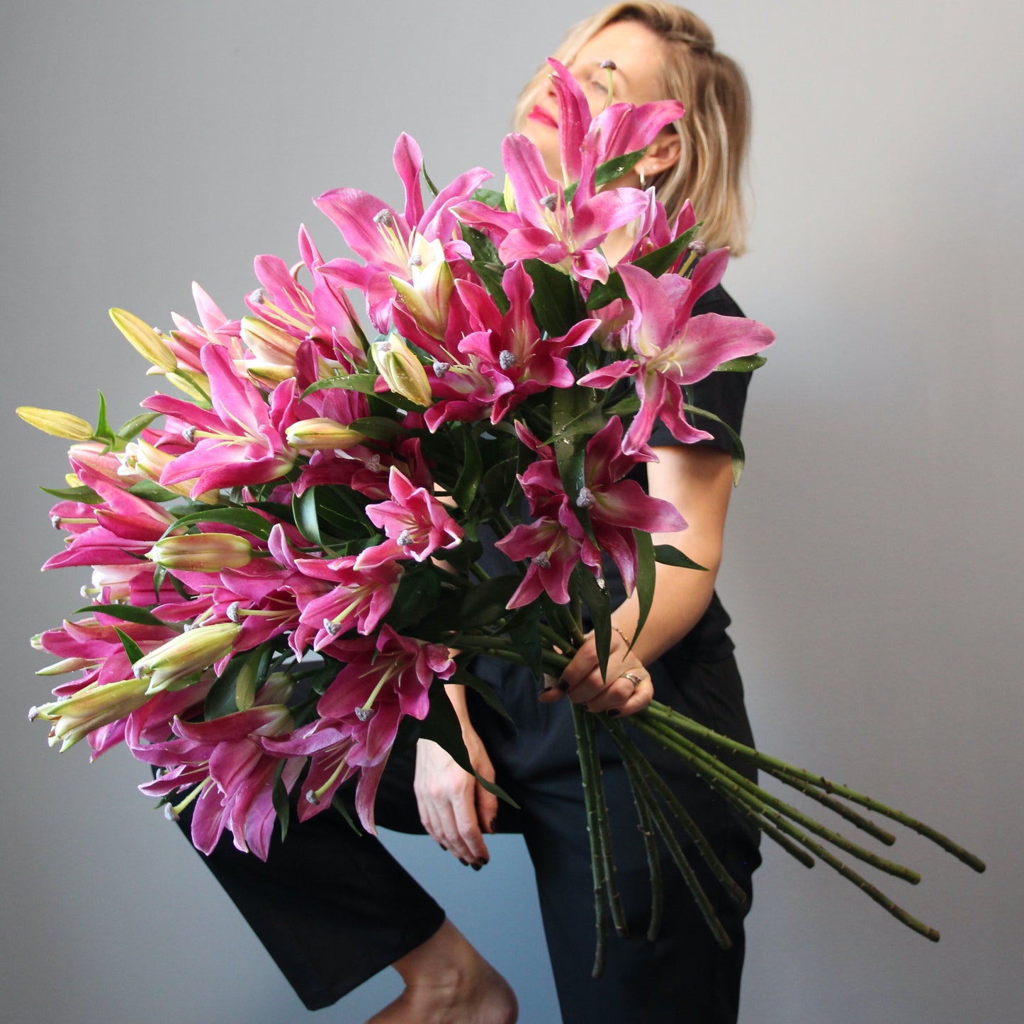 Pink lilias flowers with girl