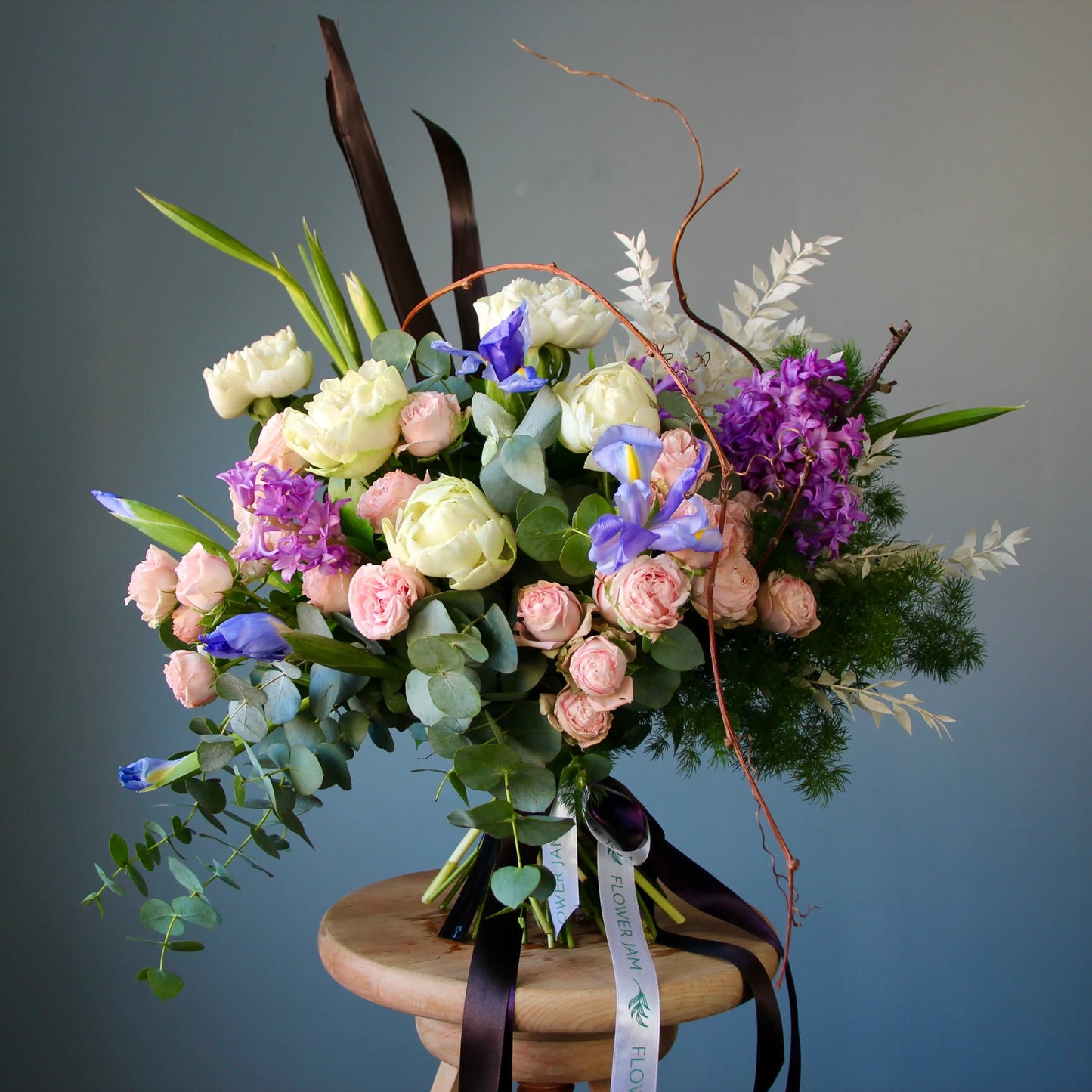 colorful bouquet of flowers with greenery and eucalipts