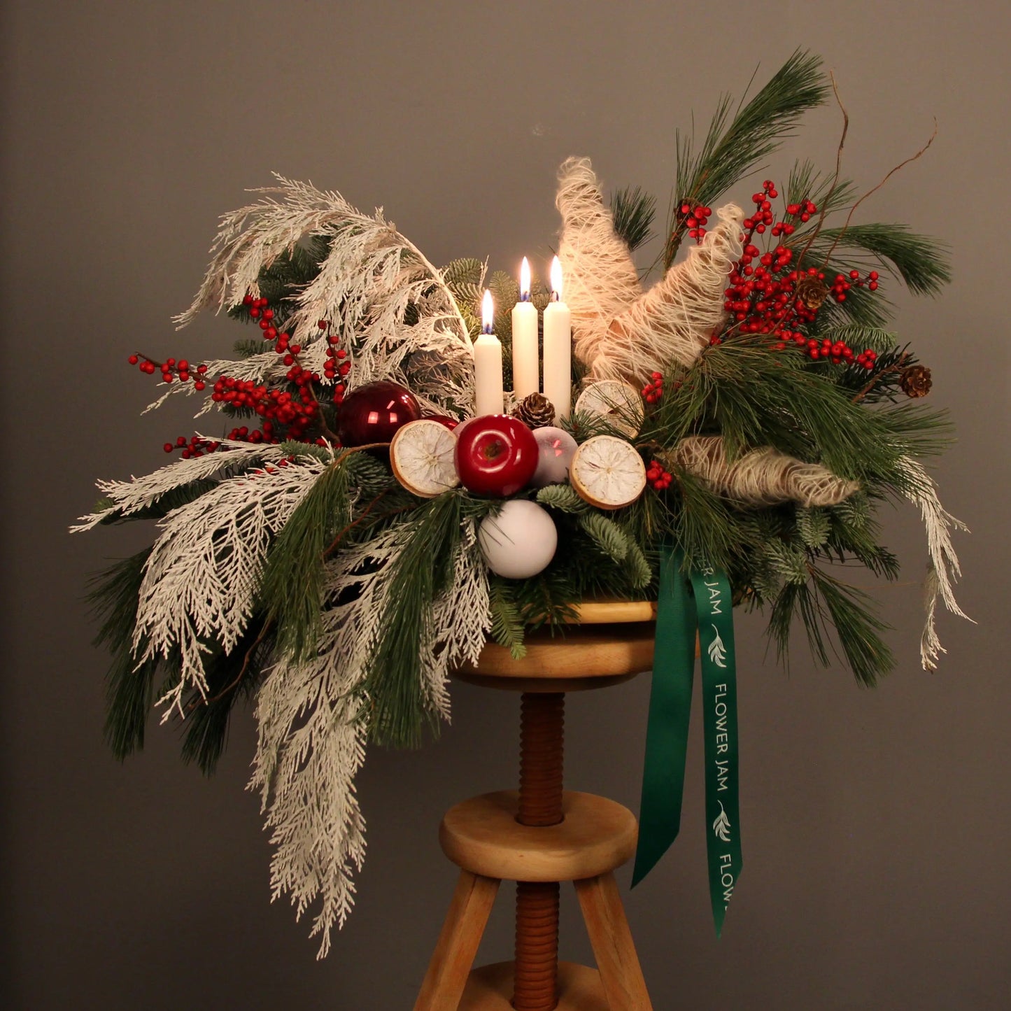 red berries branches of blue spruce Christmas Composition