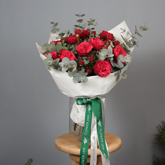 Red roses and eucalipt