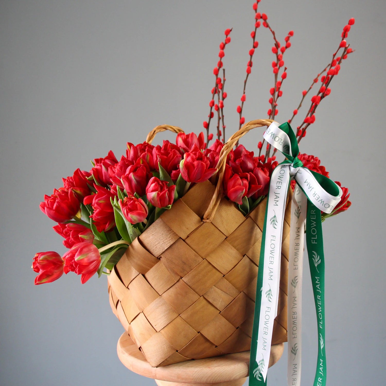basket with red tulips