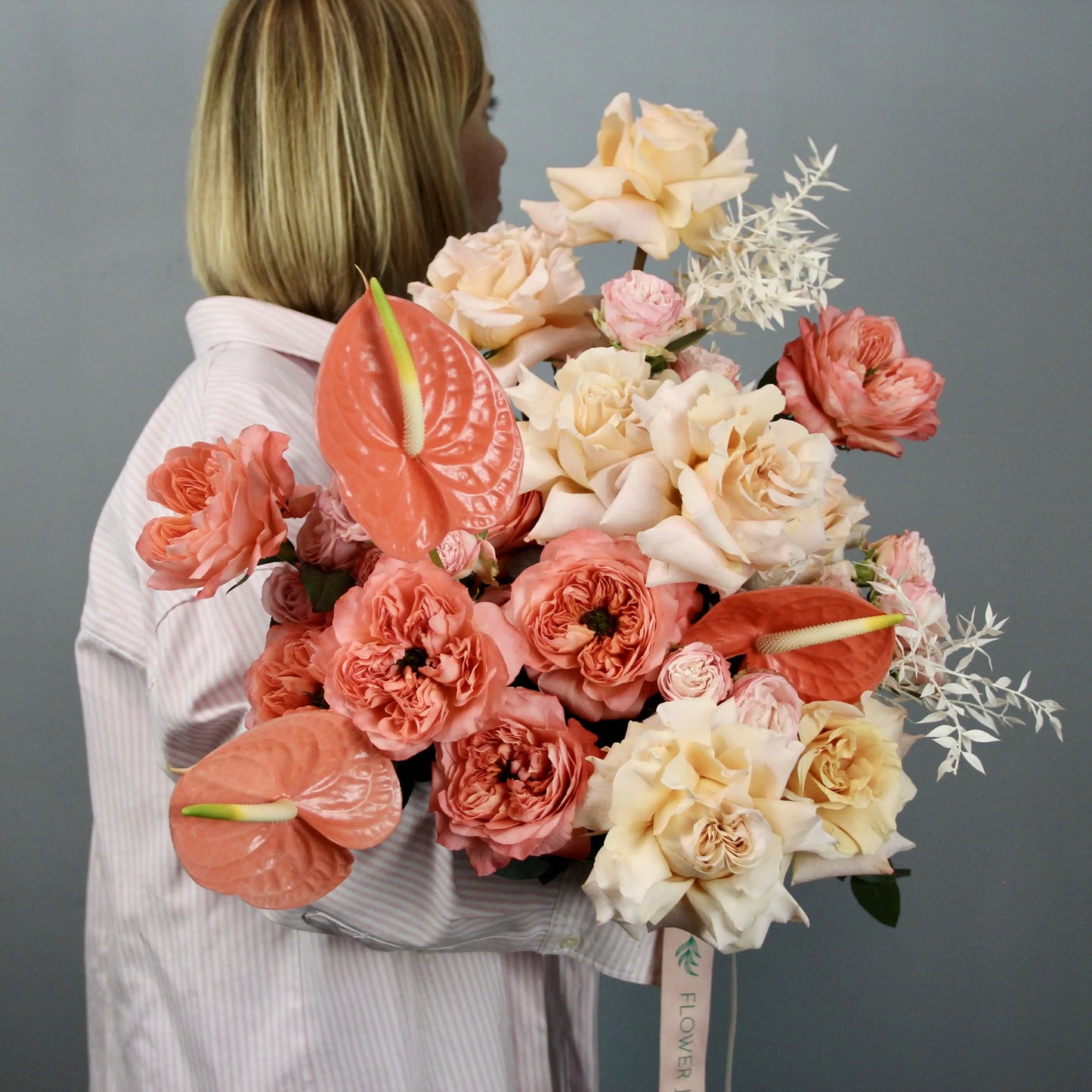 white and orange garden roses with orange antarius antarius