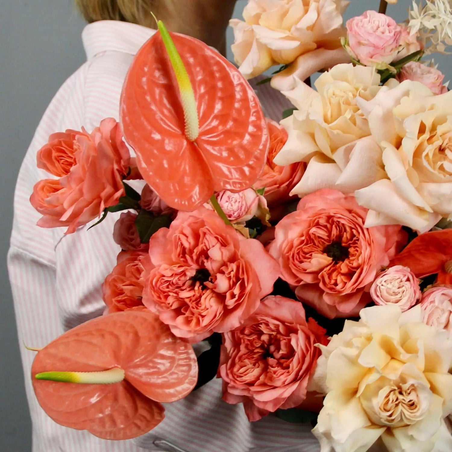 close up on a bouquet of pink and yellow flowers