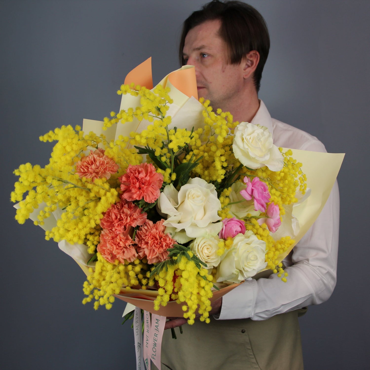 boy with yellow mimosa Bouquet of Flowers