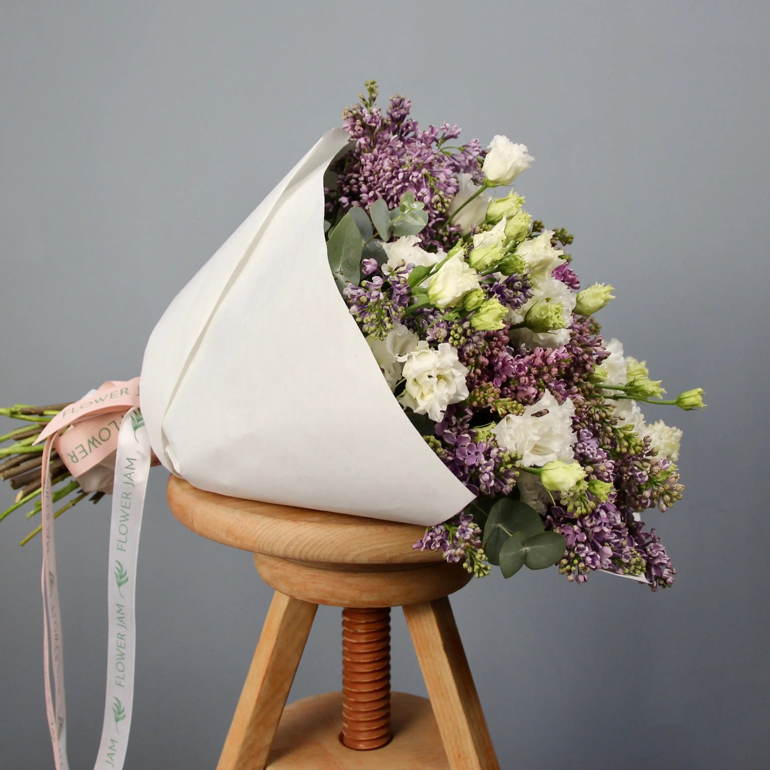 bouquet of syringa blooms and lisianthus