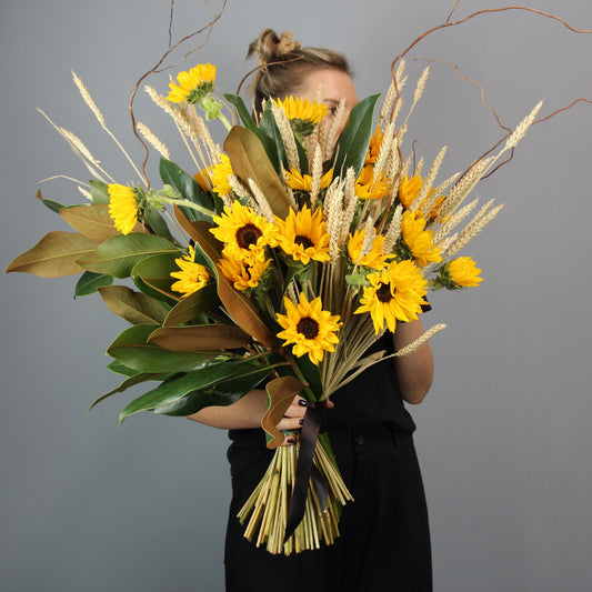 bouquet of sunflowers, wheat and greenery