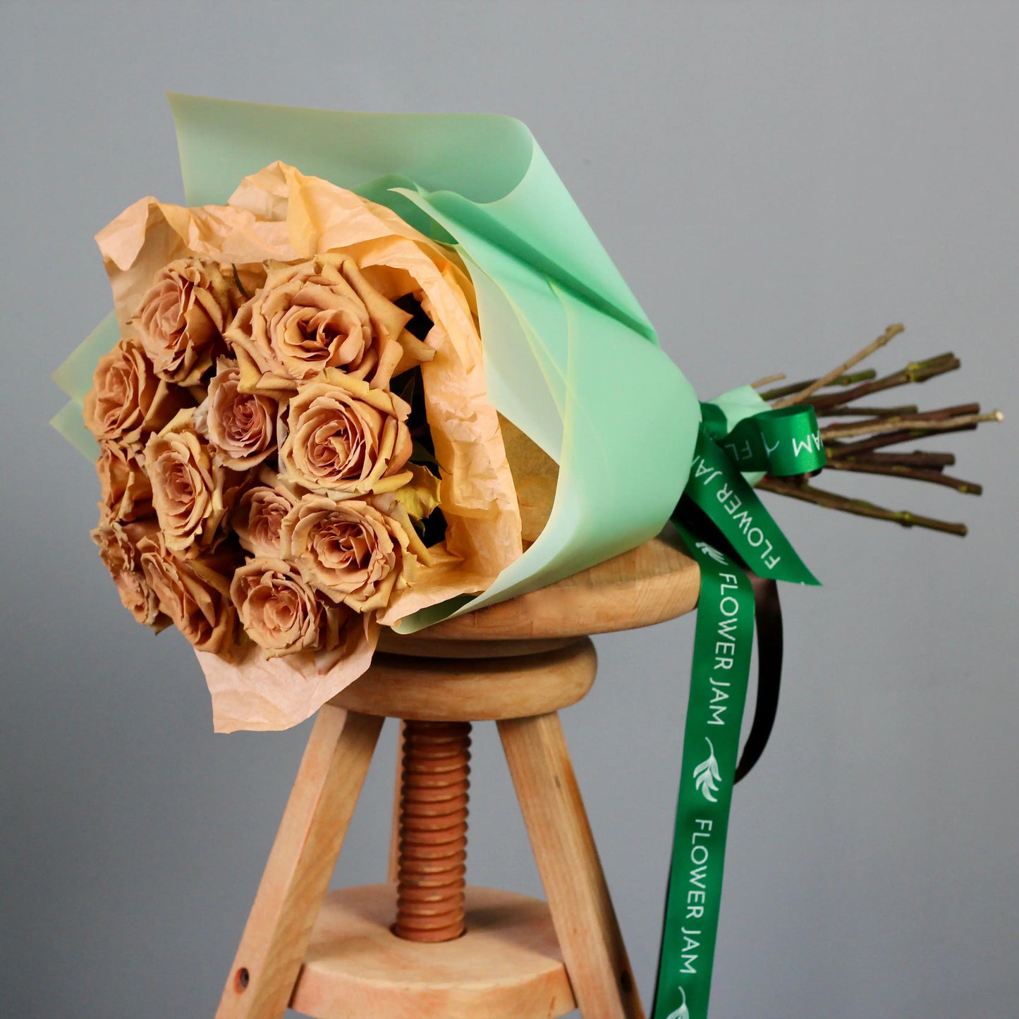 bouquet of peach roses in green