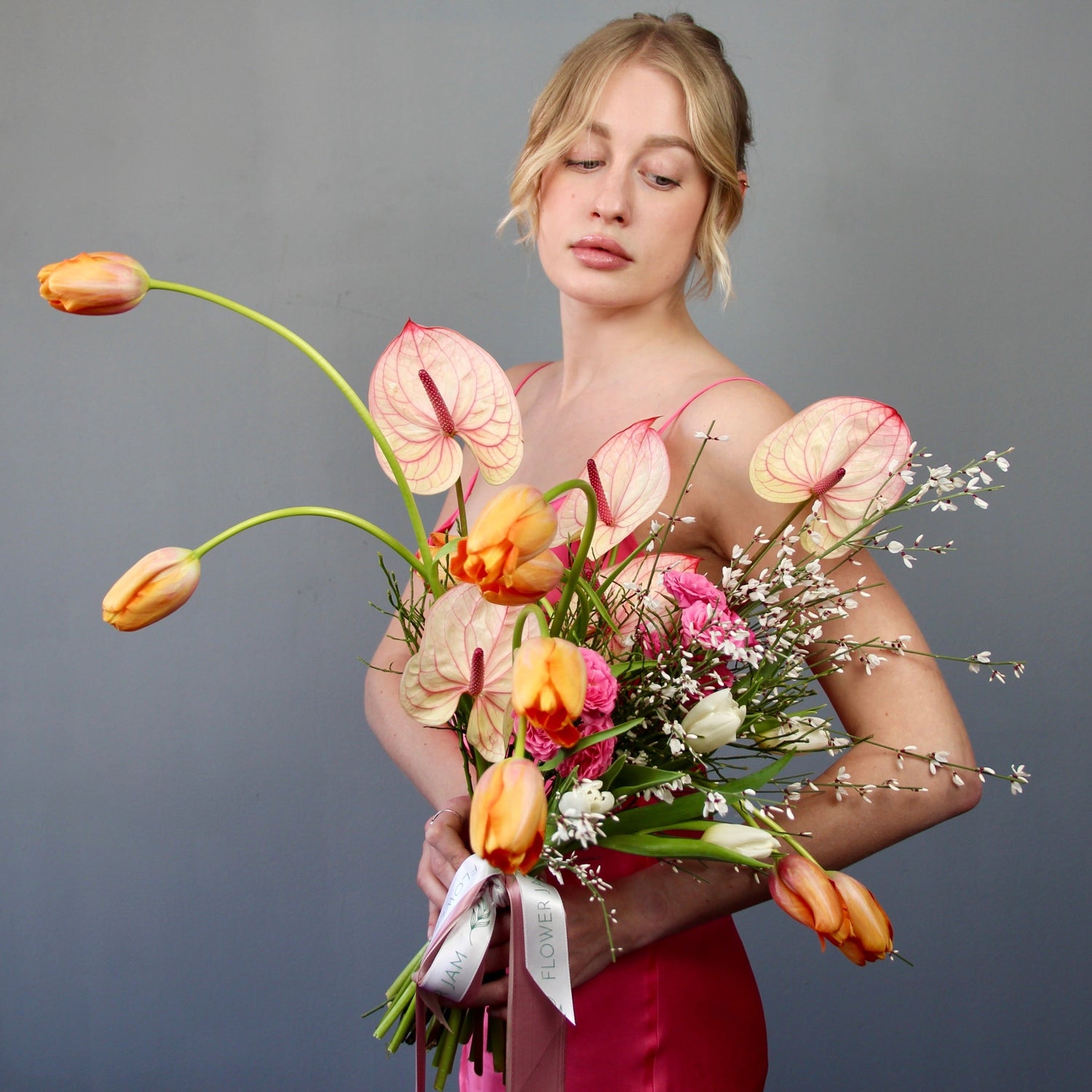 Blonde girl with roses Bouquet of Flowers