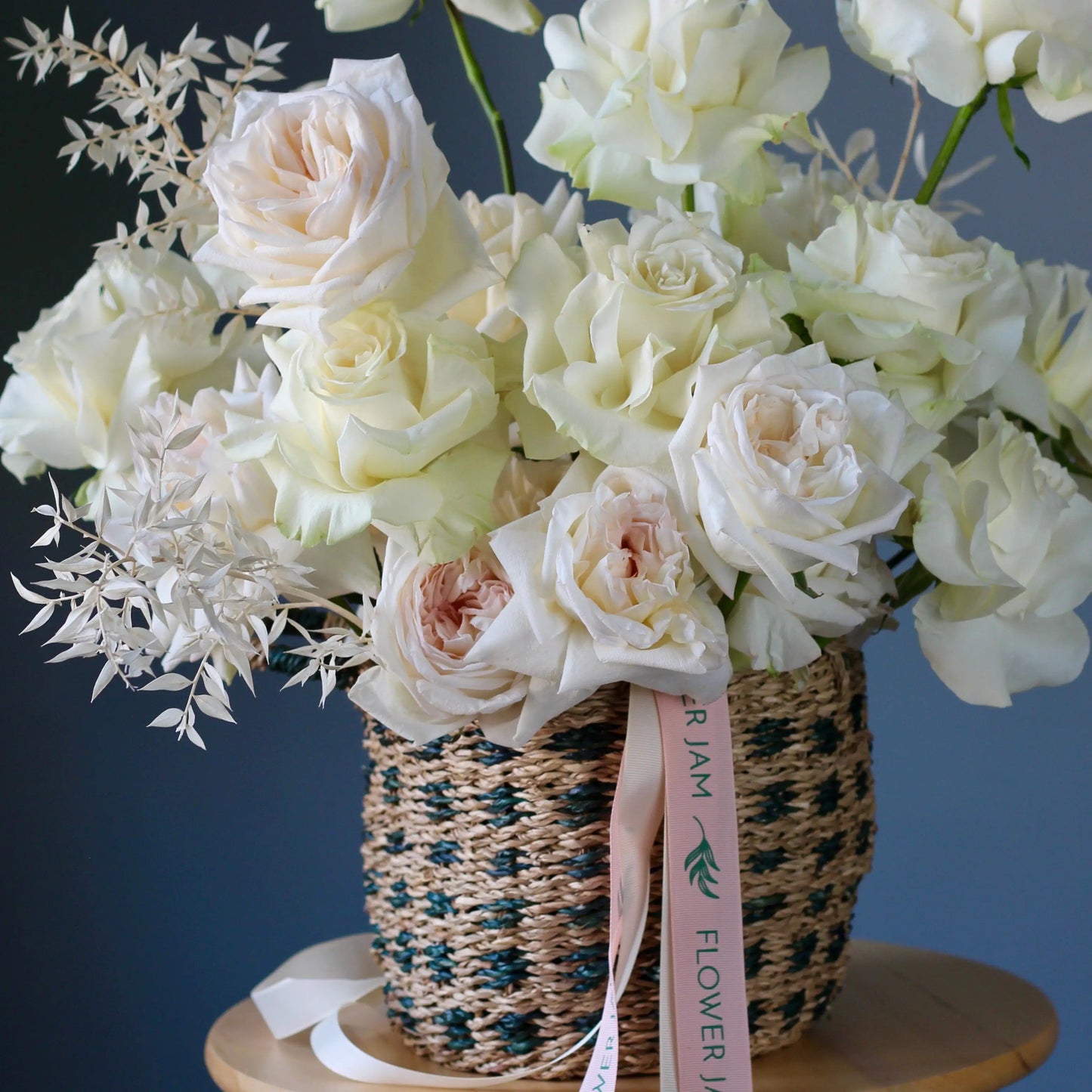 white roses in the basket genova  FLOWERS IN A BOX