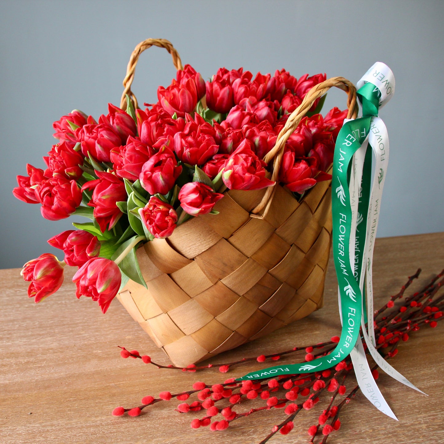 rea tulips in a basket in Genoa liguria Flowers in a basket